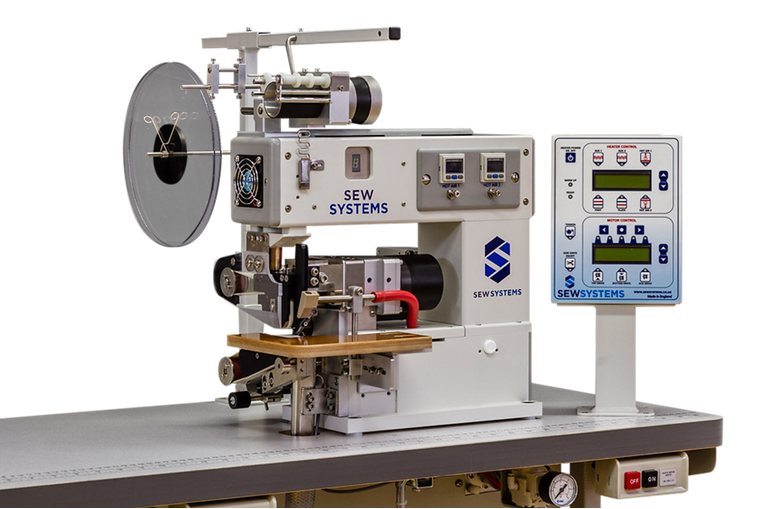A Sew Systems machine with heater and motor control panel mounted at the workstation.